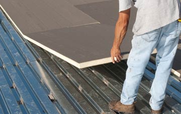 benefits of insulating Newbrough flat roofing